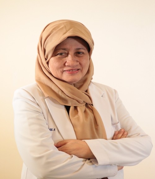 Dr. Tita Husnitawati Madjid